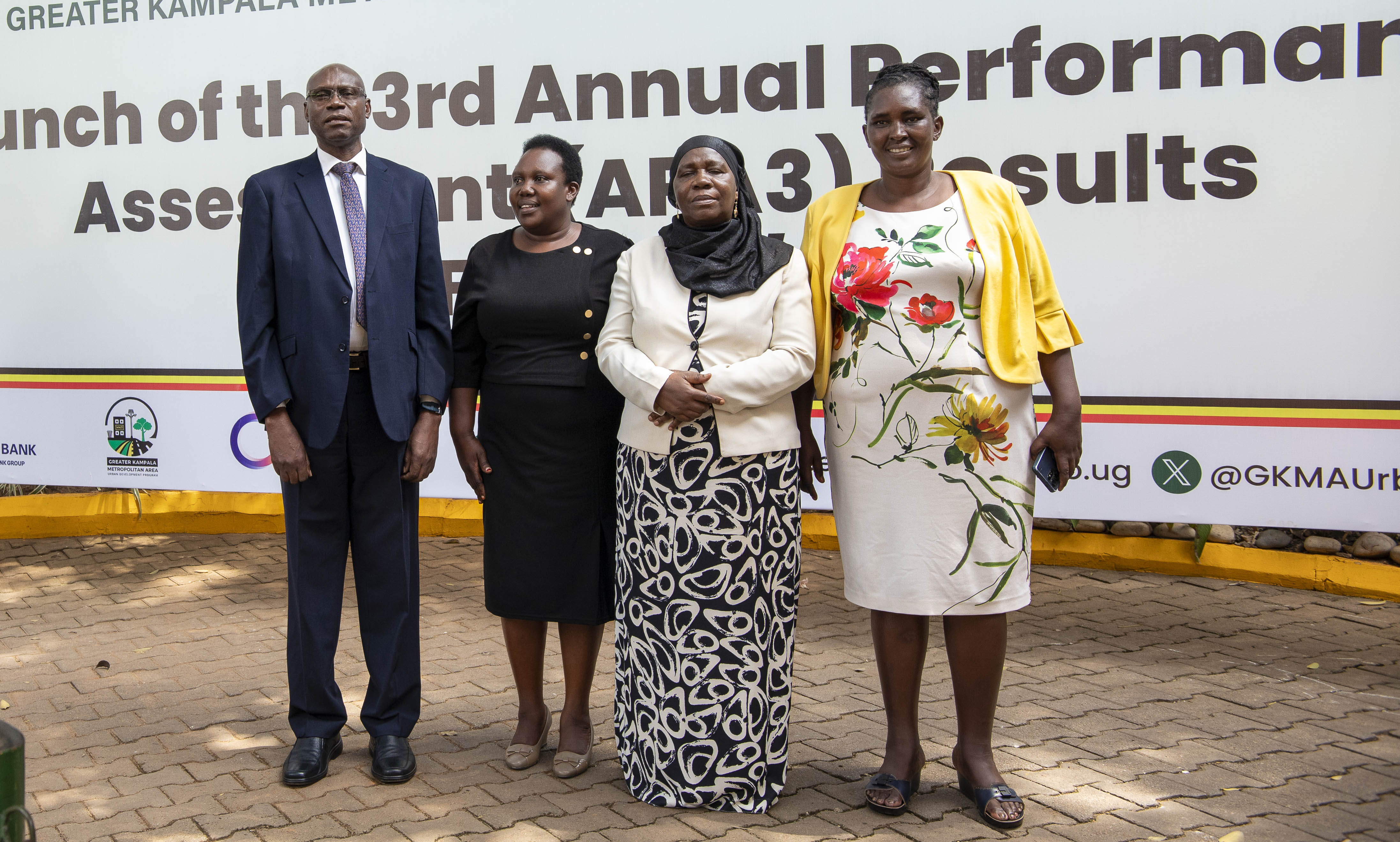 Hon. Hajjat Minsa Kabanda - Minister for Kampala Capital City and Metropolitan Affairs) flanked by Ms. Monica Ademachu Ejua - Under Secretary, MKCCMA and Ms Edith Namayega - CAO Mpigi during APA III launch at MoFPED 